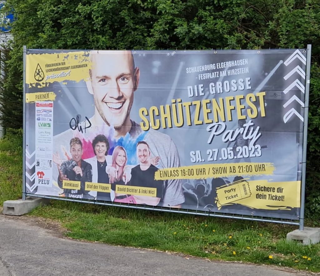 Bauzaun-Banner-Heimatfest-Schauenburg-Oli-P - Drucksachen Flyer Plakate Broschüren